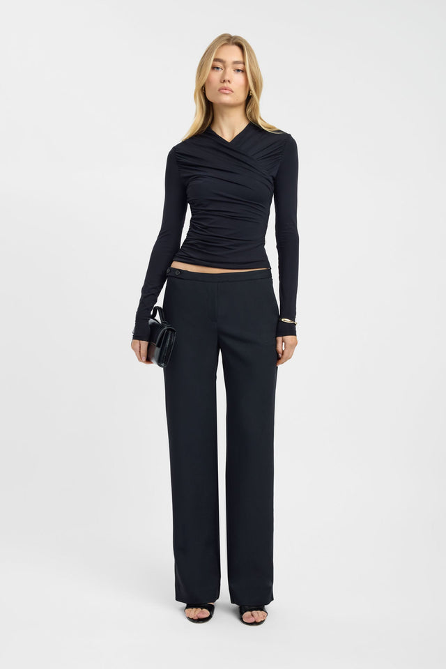 Showcasing the Alexi Long Sleeve Top womens-blouse in black with fitted silhouette, asymmetry neckline and full sleeves front