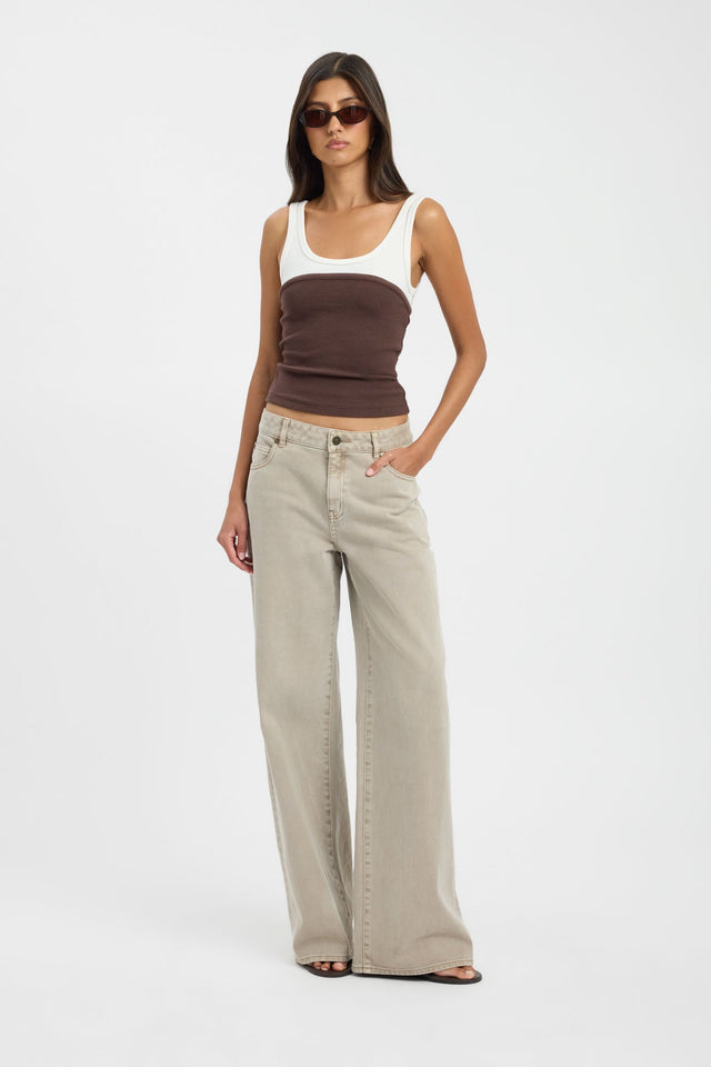 Showcasing the Elijah Top womens blouse in chocolate and white with fitted scoop neckline and sleeveless design front
