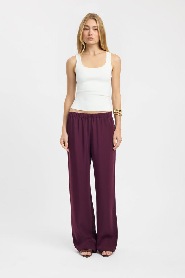 Showcasing the Maria Elastic Pant in womens regular pants with wide-leg, high-rise design and maroon colour front