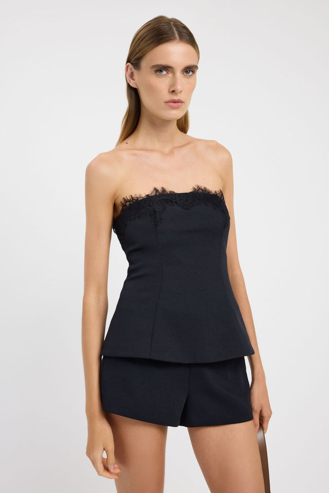 Featuring the Ariel Strapless Lace Top womens-blouse in black with fitted straight neckline and sleeveless style detail