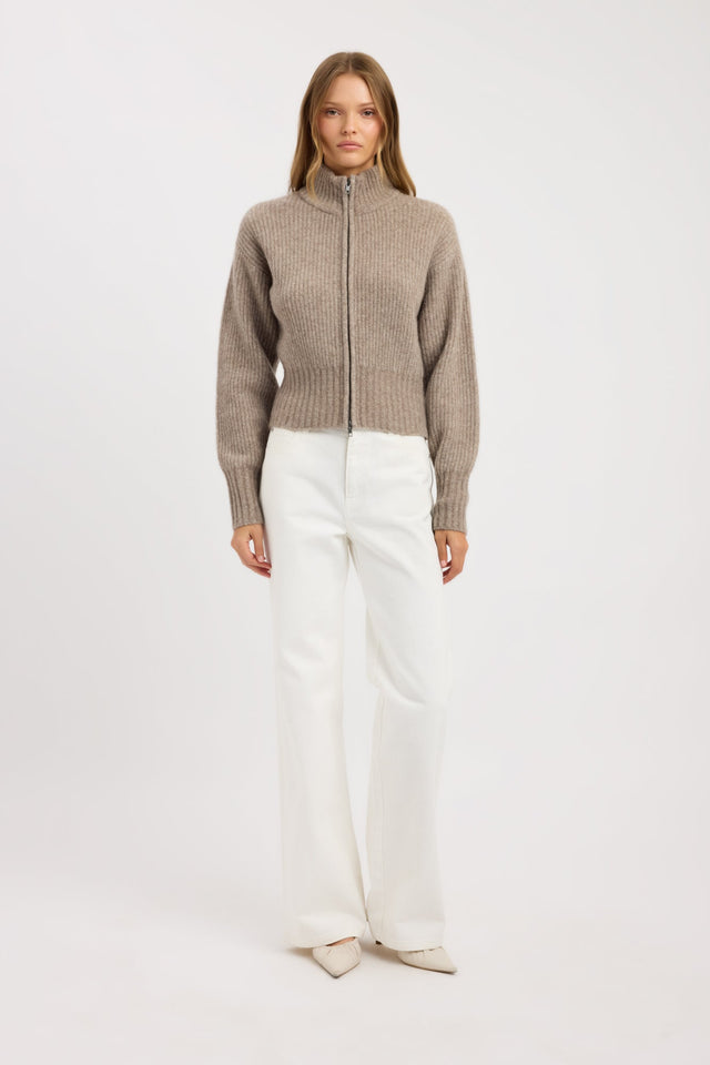 Showcasing the Irina Zip Cardigan womens jumper with high-neck and fitted silhouette in tan on-body