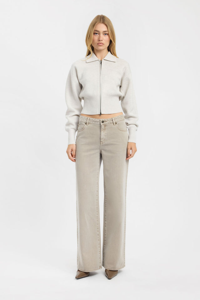 Showcasing the Dalton Collared Cardigan womens jumper with fitted silhouette in ivory on-body