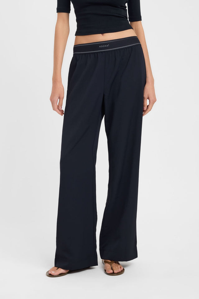 Featuring Opal Branded Elastic Pant in womens regular pants with wide-leg mid-rise design detail