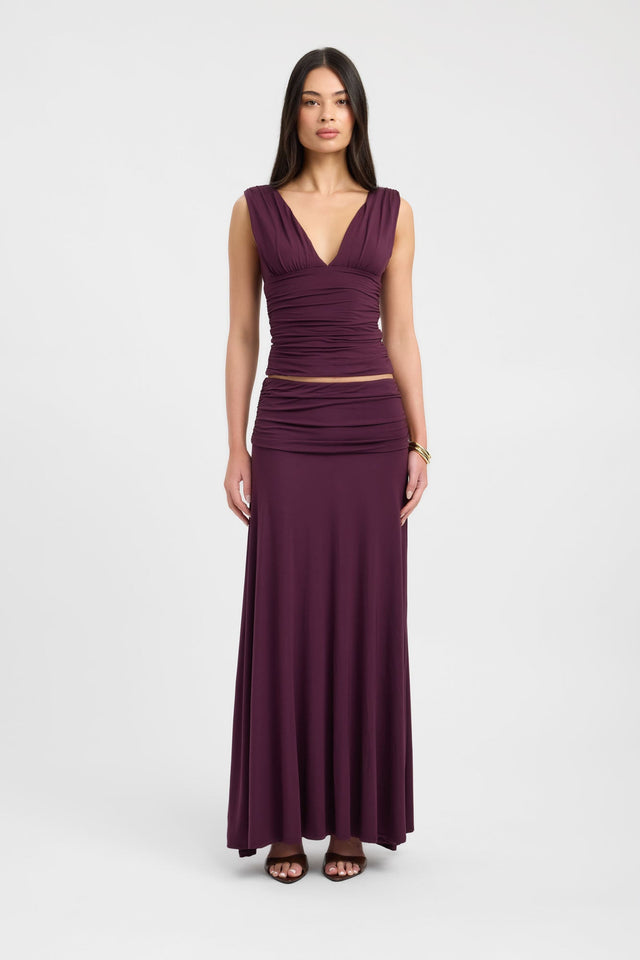 Showcasing the Solis Top womens blouse in maroon with fitted silhouette, v-neck and sleeveless design front