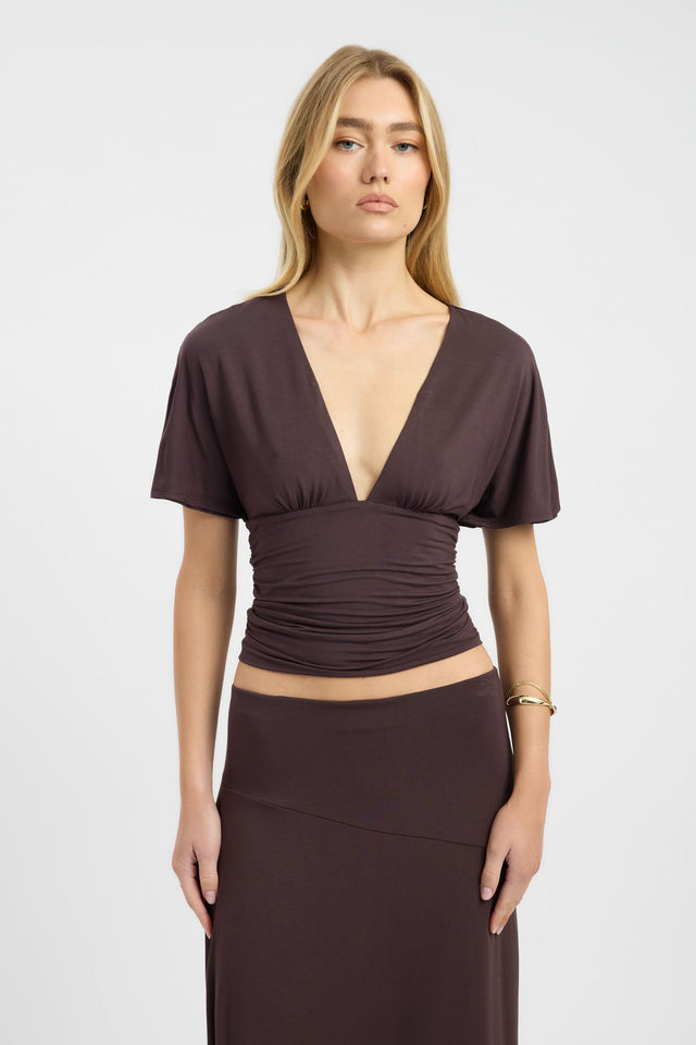 Designed with the Isla Top womens blouse in brown featuring fitted v-neck and short sleeves detail