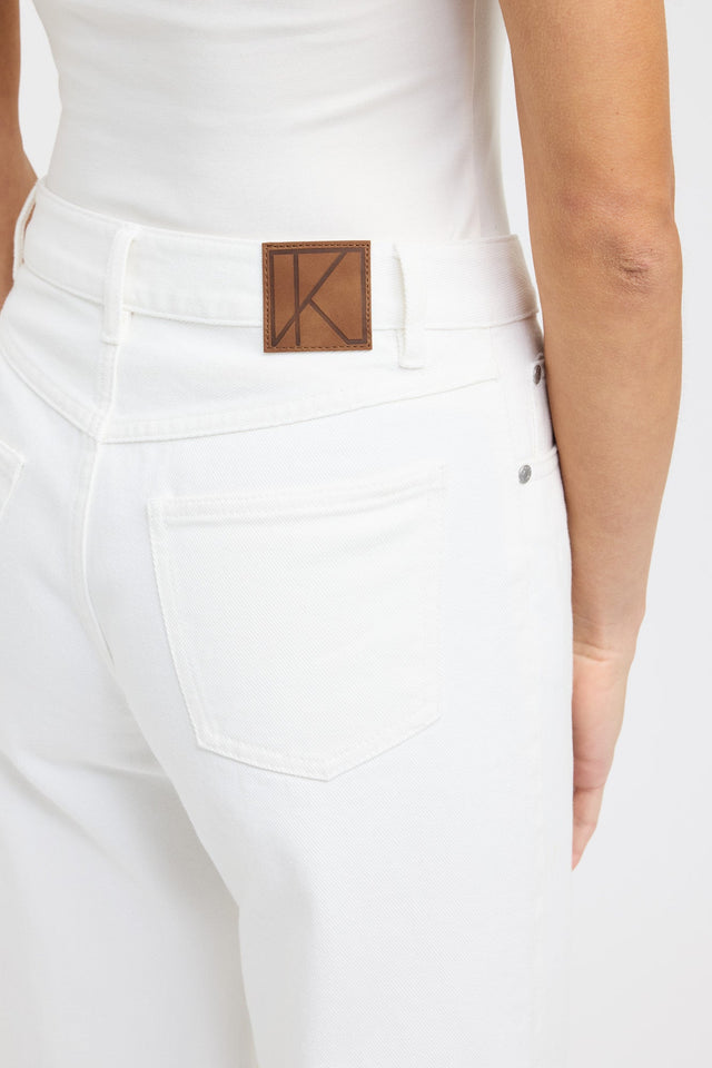 Featuring the Kai Straight Leg Jean in womens regular pants, crafted with high-rise fit and white side