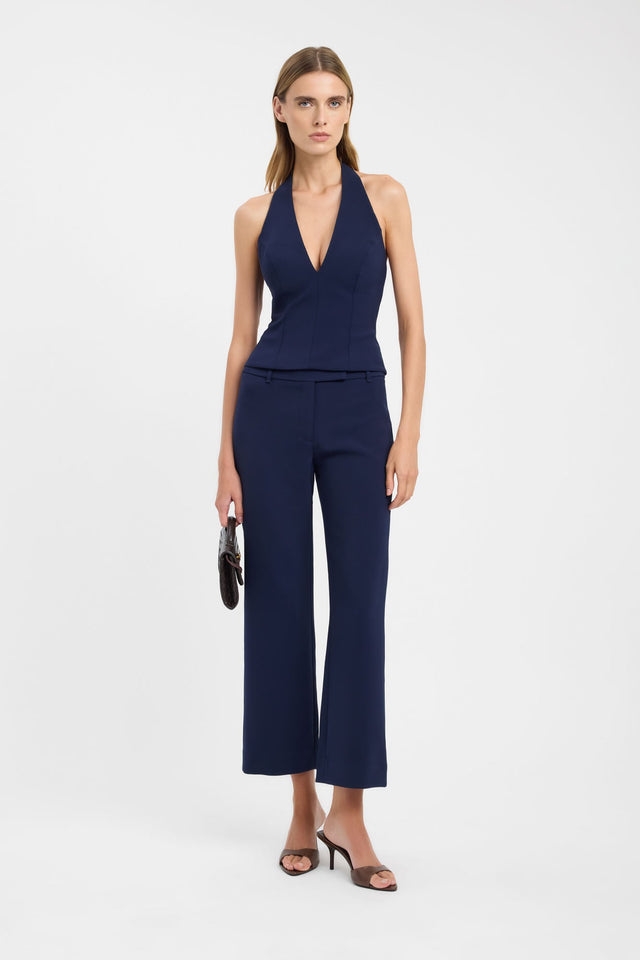 Showcasing the Alto Vee Halter Top womens-blouse in navy with fitted v-neck sleeveless design on-body